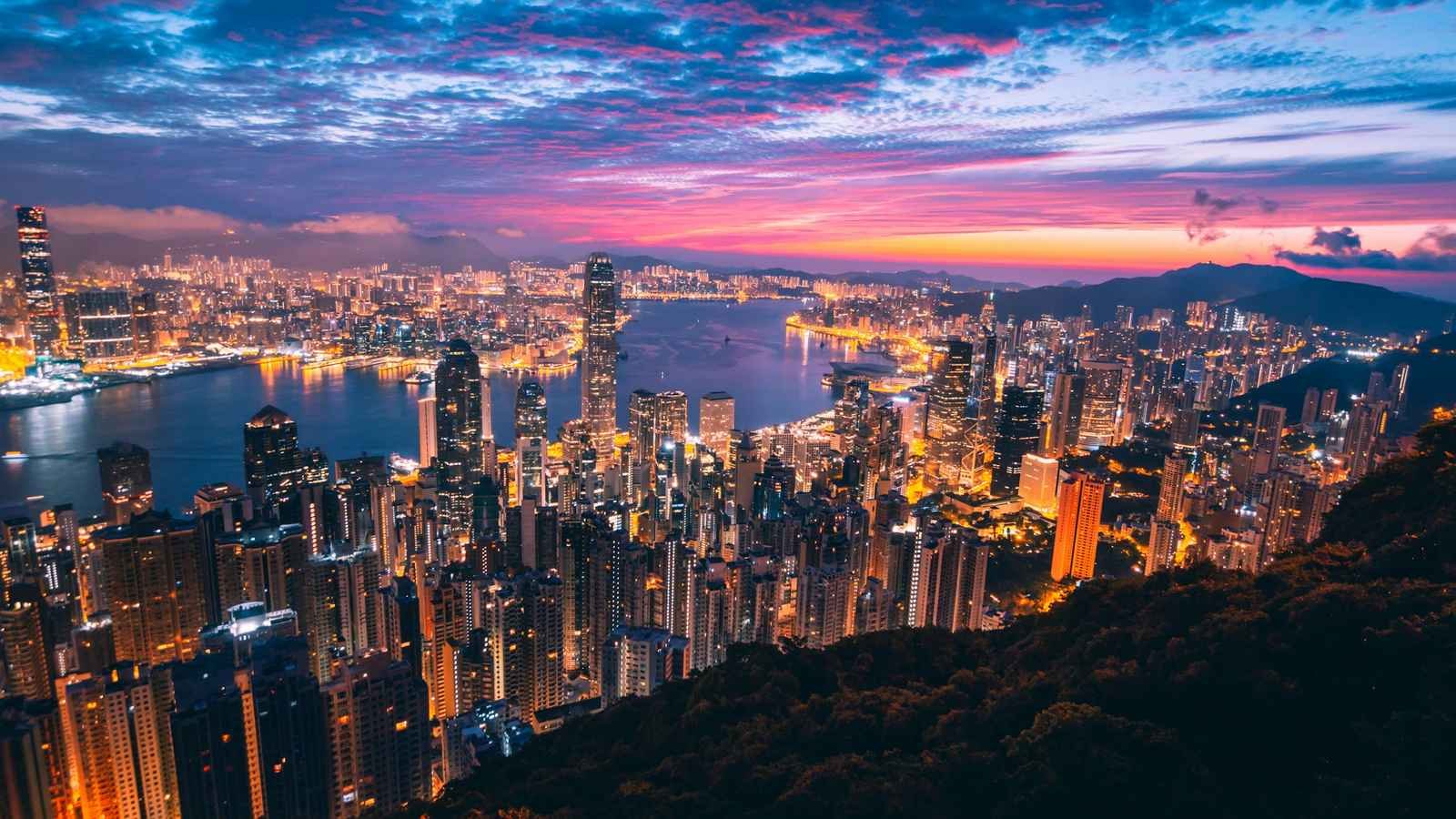 Hong Kong skyline and Victoria Harbour at dusk, viewed from Victoria Peak