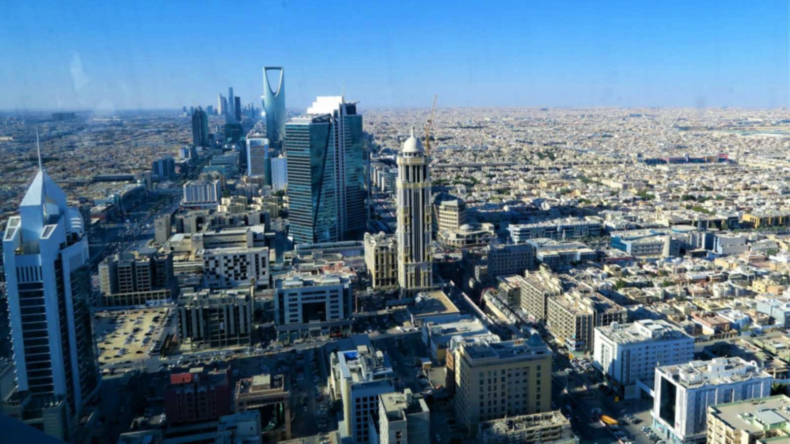 Riyadh skyline seen from a tower balcony across the King Fahd Road business district