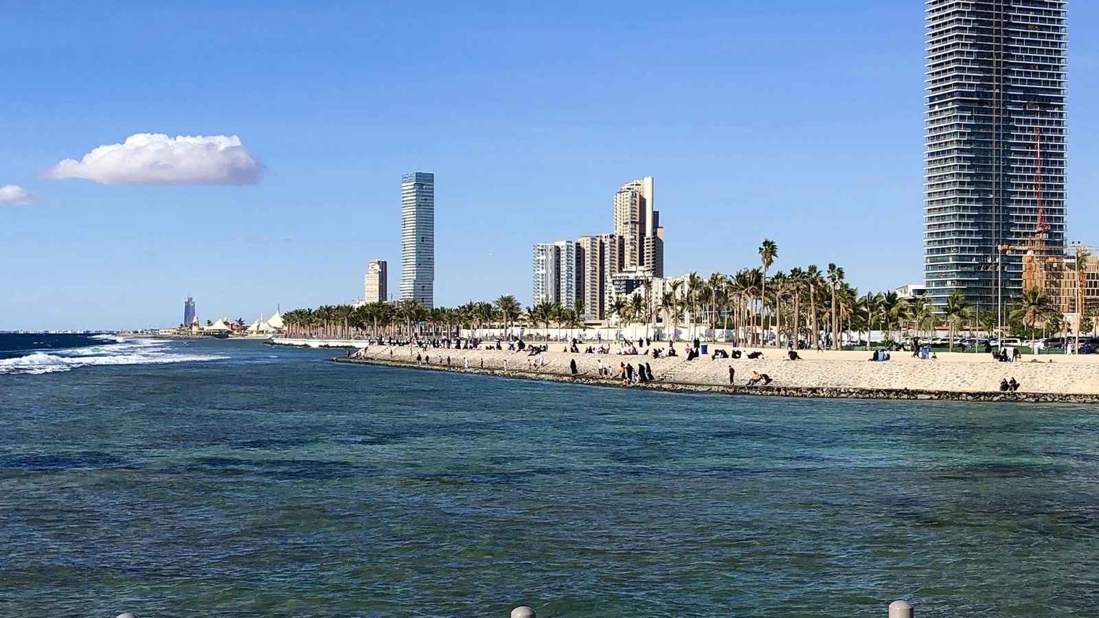 The Jeddah Corniche waterfront on the Red Sea, with the modern city skyline behind the promenade